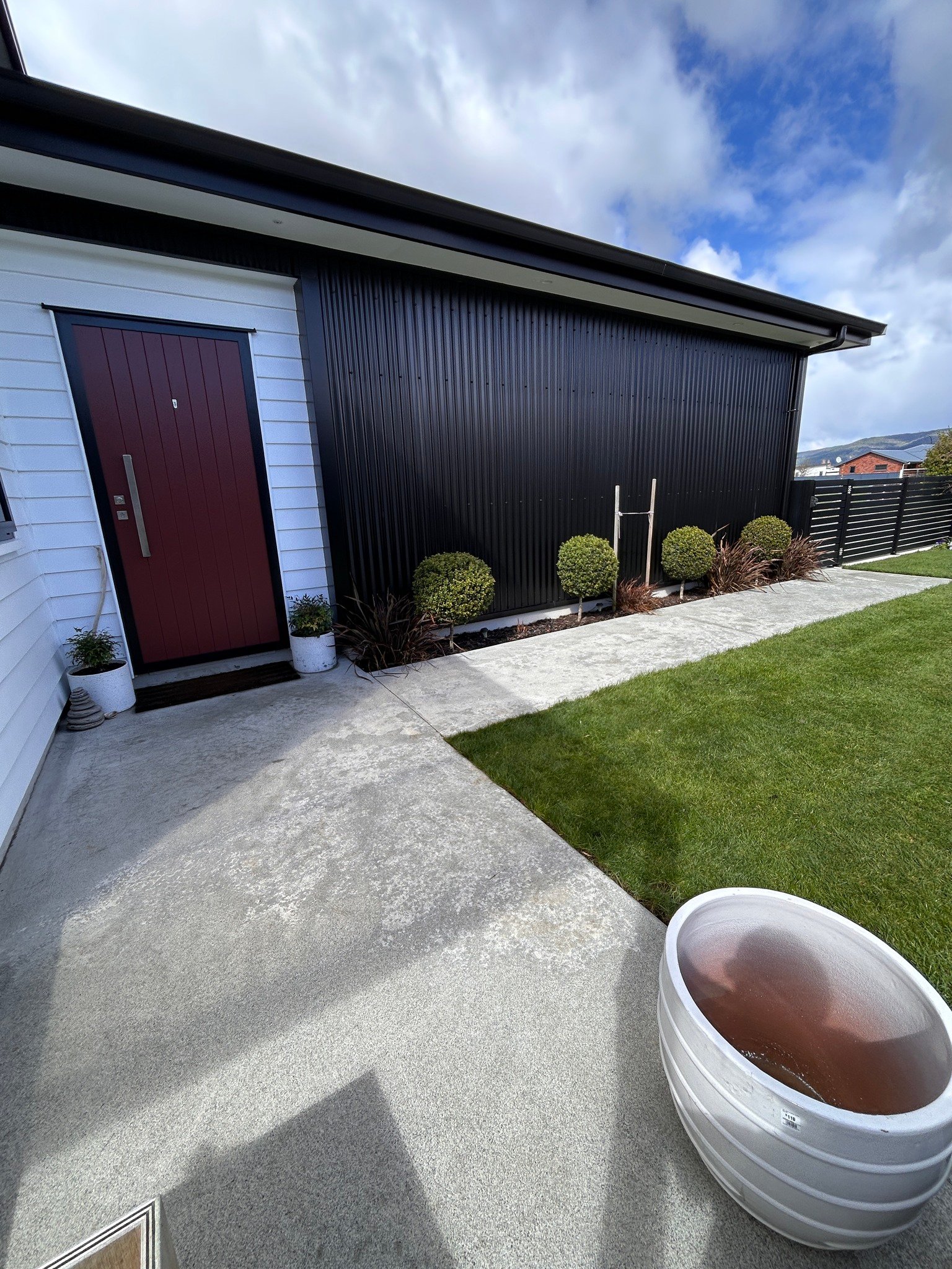 Spider spraying rural Southland